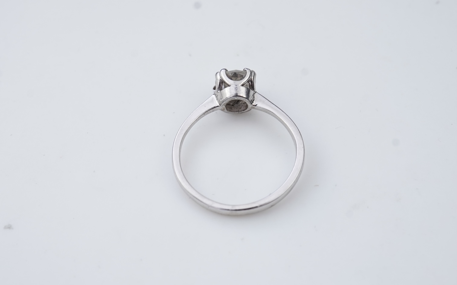 A diamond solitaire ring
